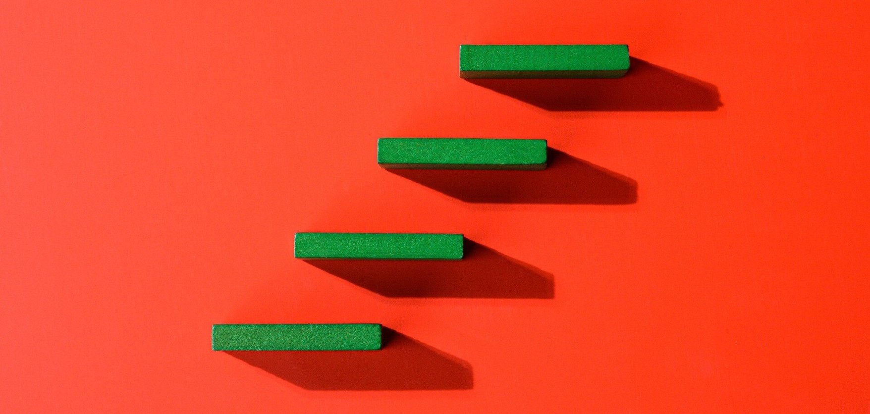 Red background with green steps