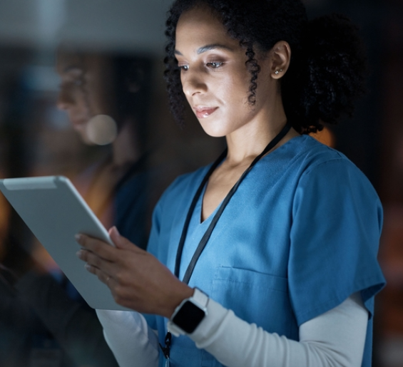 scientist-looking-at-tablet-1